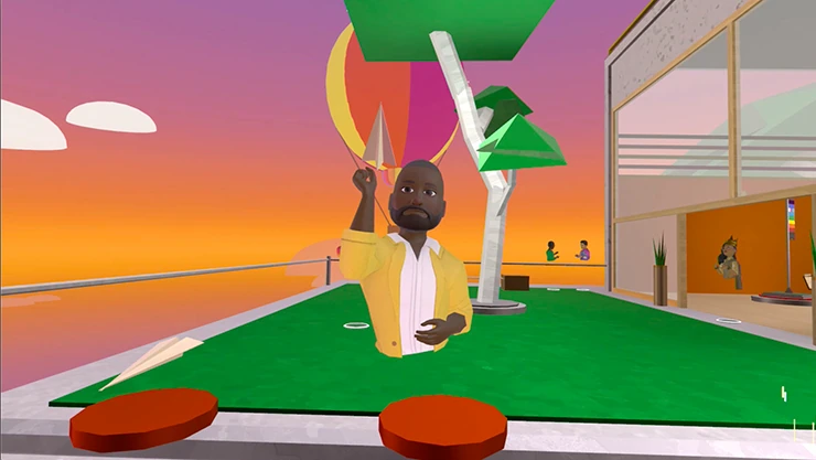 Visitor welcomes guests in an open-air world space